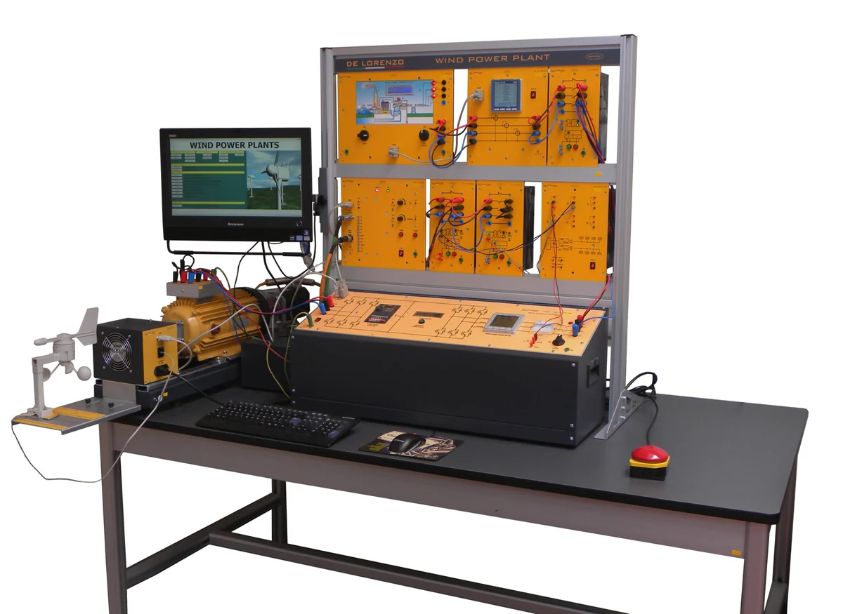 Sistema didáctico de generador de inducción doblemente alimentado en mesa de trabajo, con bastidor de módulos, máquina eléctrica y monitor (foto del fabricante)